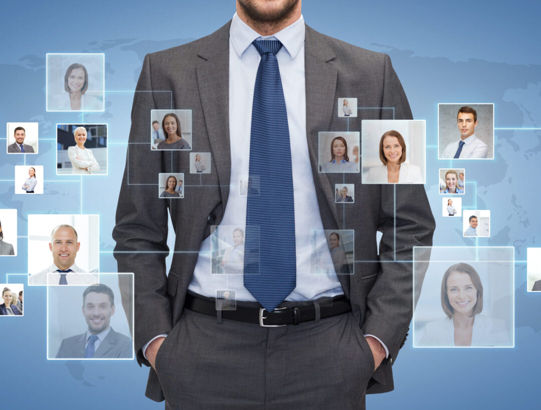 corporate business, people and cooperation concept - close up of businessman over blue background with icons of contacts