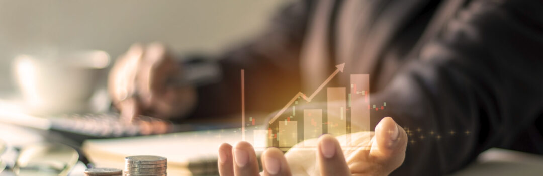 Financial growth graph on hand, business people are documenting office finance, financial ideas and loan investments.