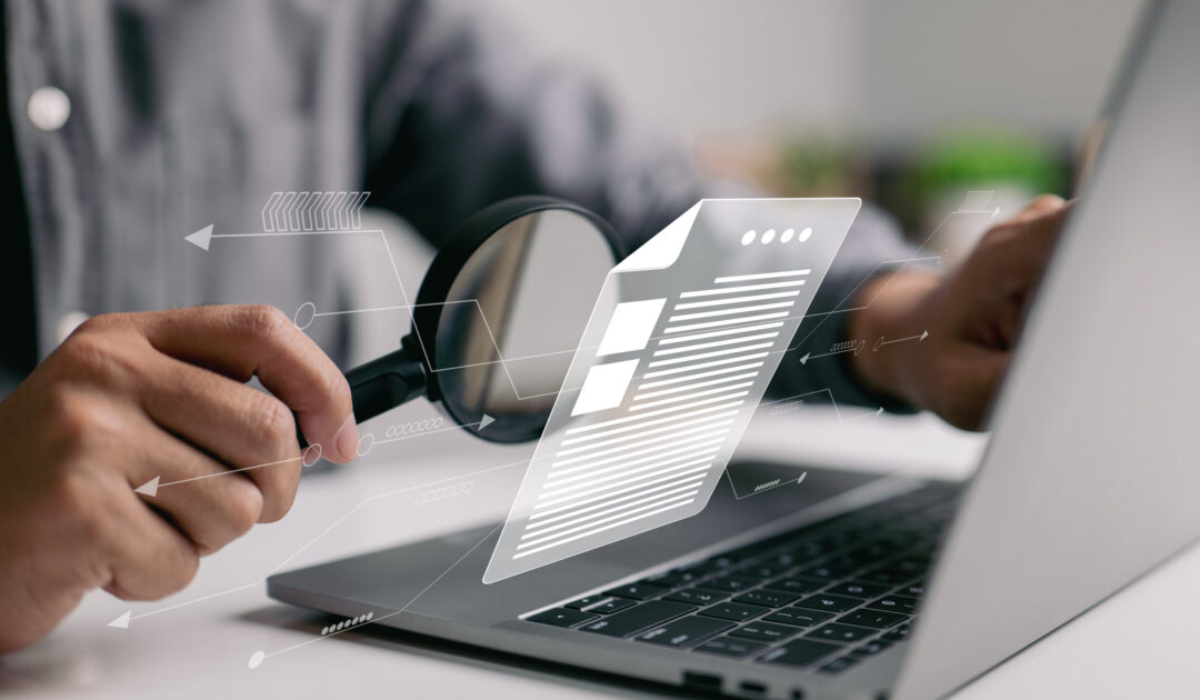 Man inspecting paperwork with magnifier. A business analysis concept.